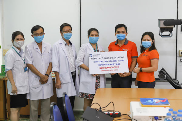 HUNG THINH CORP AND AN CUONG WOOD CONTRIBUTE AGAINS COVID 19
